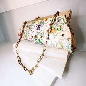 Gold and floral chain clutch handbag